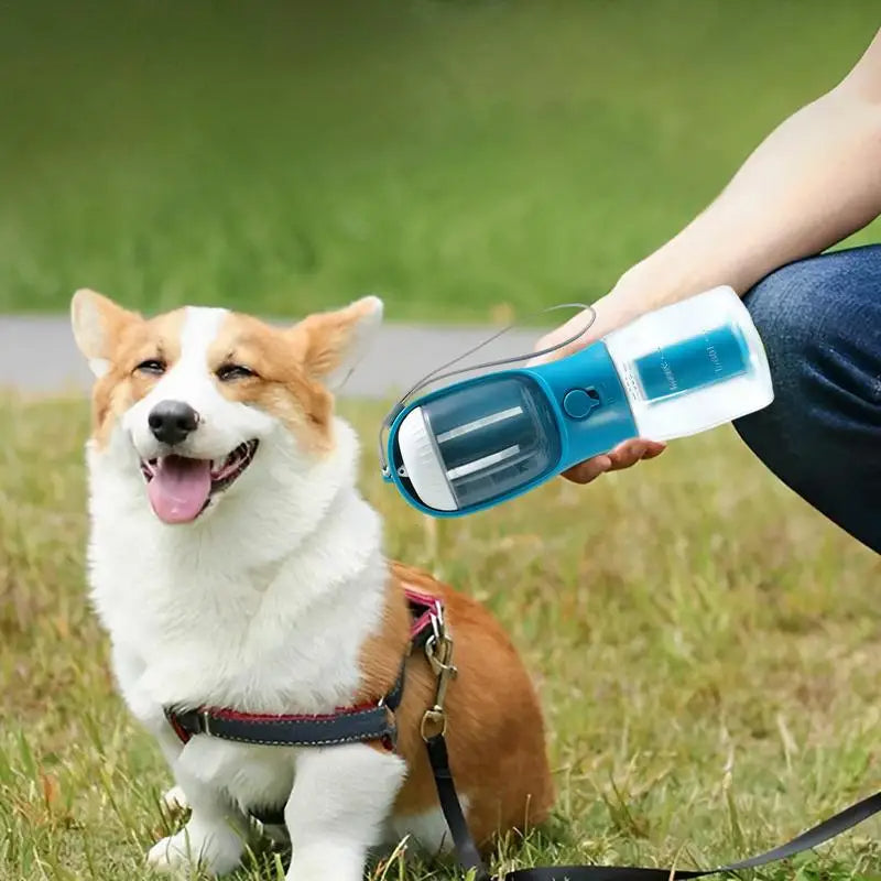 👉 OURCARTS™ 3-in-1 Dog Water Bottle – Portable Pet Travel Feeding & Waste Kit